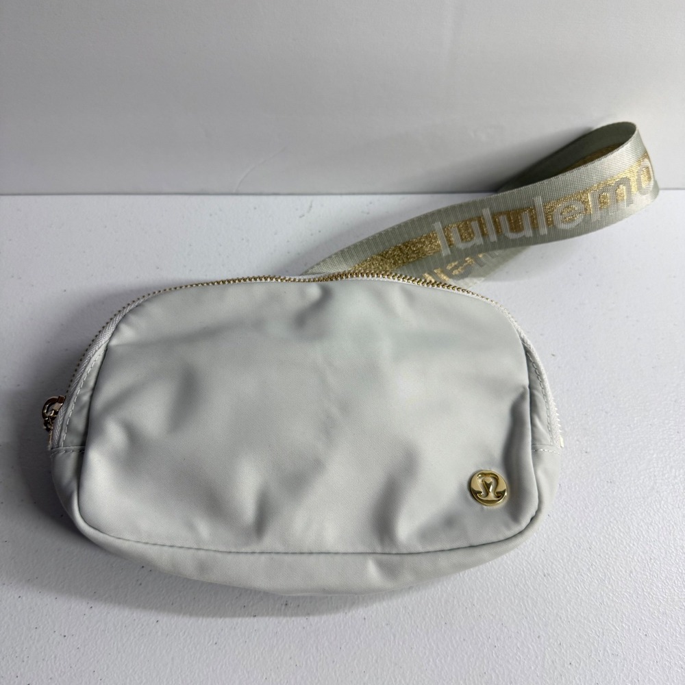Lululemon Everywhere Belt Bag 1L Crossbody Light Gray Gold Tone Hardware Travel